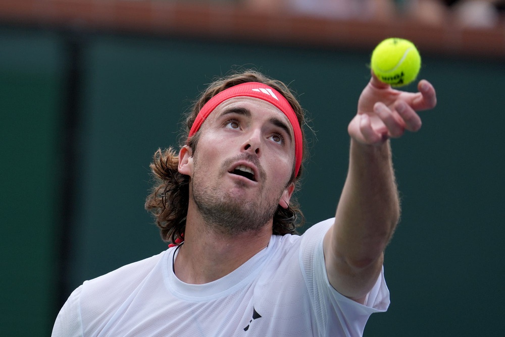 Syndication: Desert Sun Stefanos Tsitsipas looks to serve in a match against Holger Rune at Indian Wells in 2025.