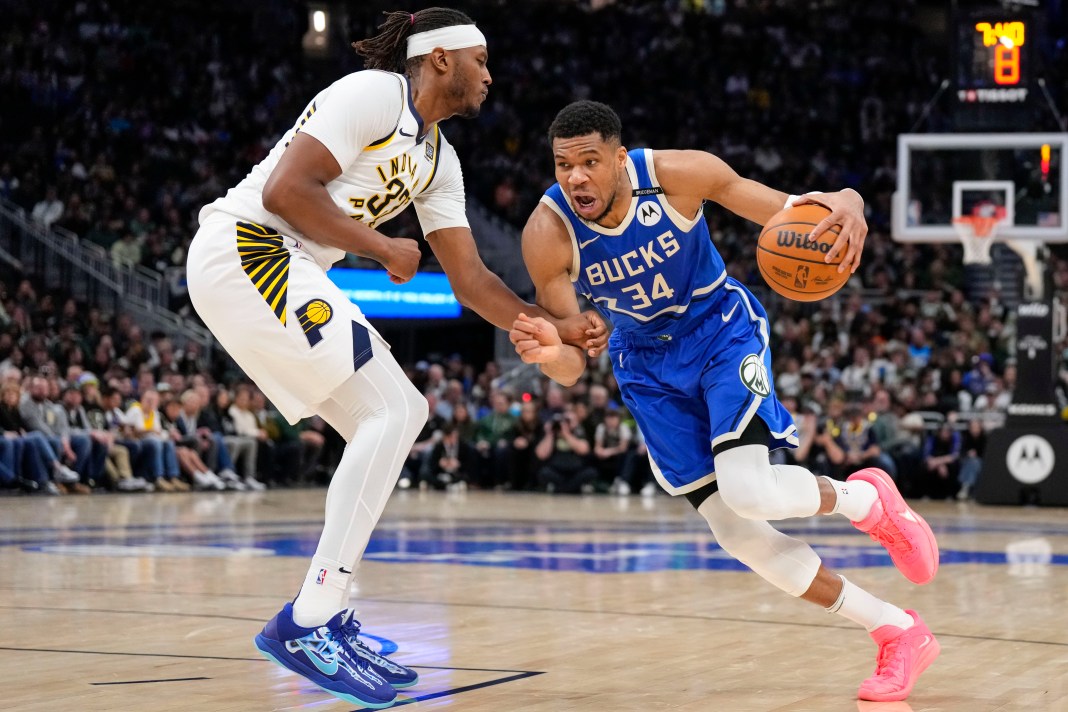 NBA: Indiana Pacers at Milwaukee Bucks Milwaukee Bucks forward Giannis Antetokounmpo (34) drives for the basket against Indiana Pacers center Myles Turner (33) during the fourth quarter at Fiserv Forum in Milwaukee, Wisconsin, on March 15, 2025.