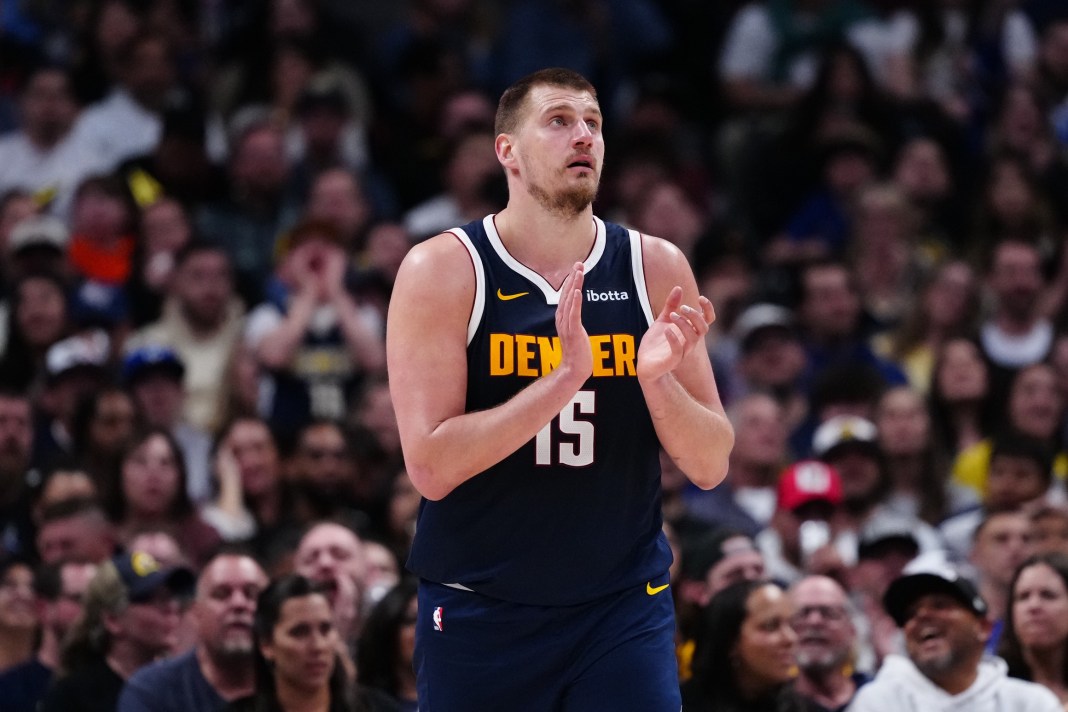 Nuggets superstar Nikola Jokic claps during a game against the Jazz during the 2024-25 NBA season.