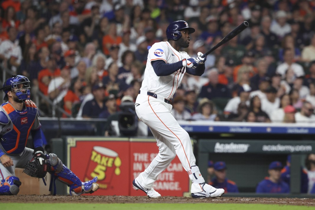 Houston Astros designated hitter Yordan Alvarez (44) hits an RBI double during the sixth inning of the game against the New York Mets at Daikin Park in Houston, Texas, on March 29, 2025.