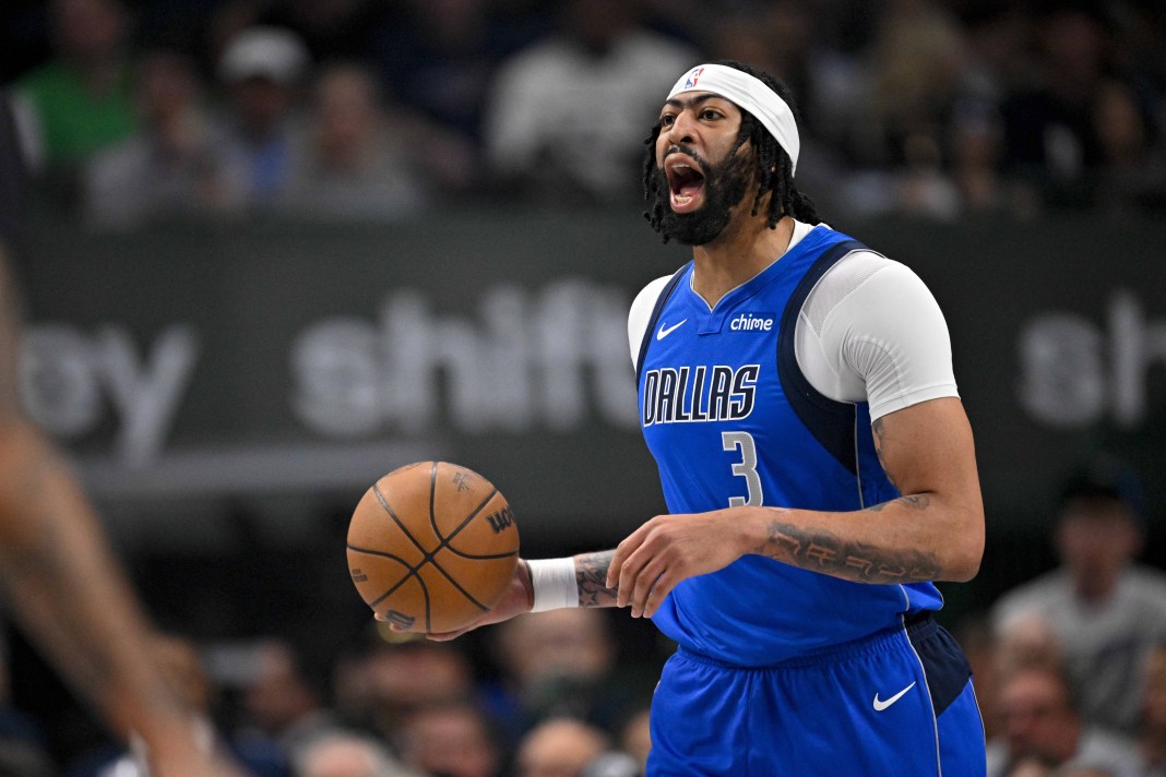 Mavericks star Anthony Davis runs a play against the Nets during the 2024-25 NBA season.