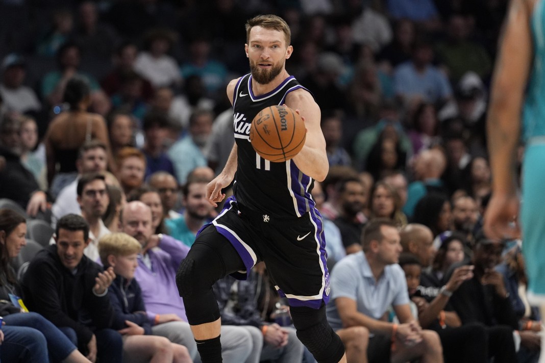Kings star Domantas Sabonis brings the ball up against the Hornets during the 2024-25 NBA season.