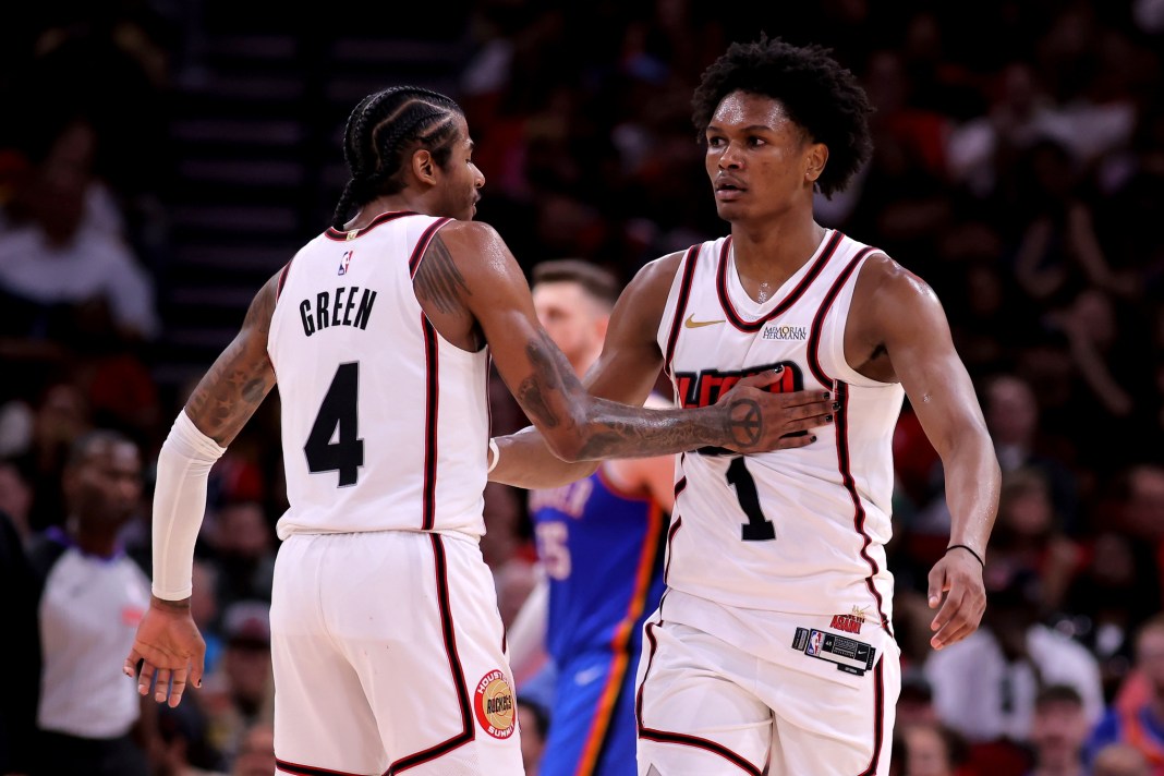 Rockets guards Jalen Green and Amen Thompson celebrate against the Thunder during the 2024-25 NBA season.