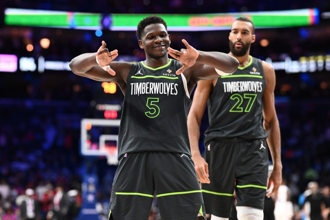 Timberwolves star Anthony Edwards reacts to a basket against the 76ers during the 2024-25 NBA season.