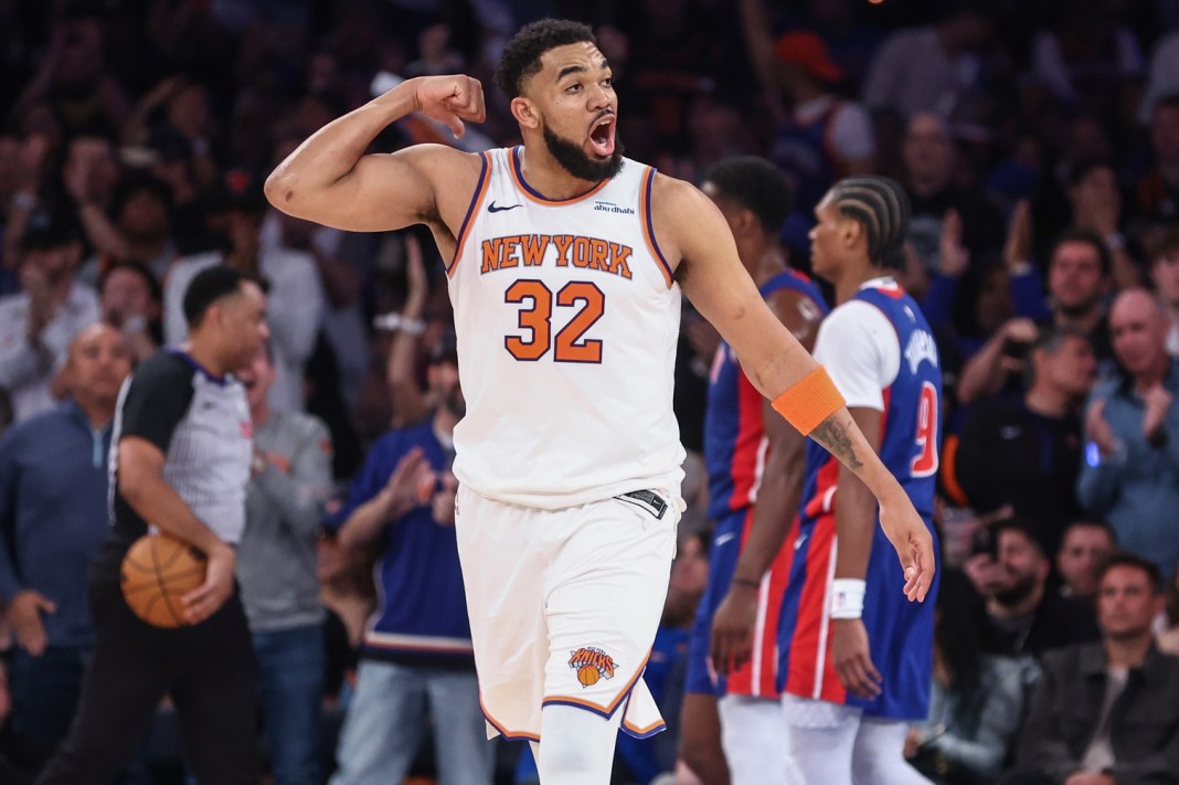 Knicks star Karl-Anthony Towns celebrates a basket against the Pistons during the 2024-25 NBA Playoffs.