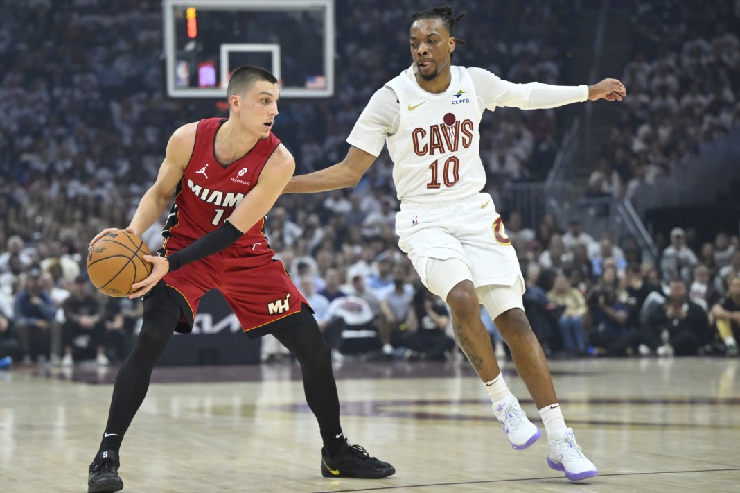 NBA: Playoffs-Miami Heat at Cleveland Cavaliers Heat guard Tyler Herro tries to score against Cavaliers guard Darius Garland during the 2024-25 NBA Playoffs.