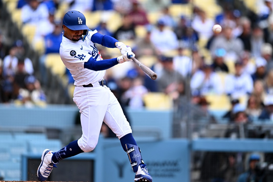 Los Angeles Dodgers shortstop Mookie Betts (50) singles during the first inning of the game against the Pittsburgh Pirates at Dodger Stadium in Los Angeles, California, on April 27, 2025.