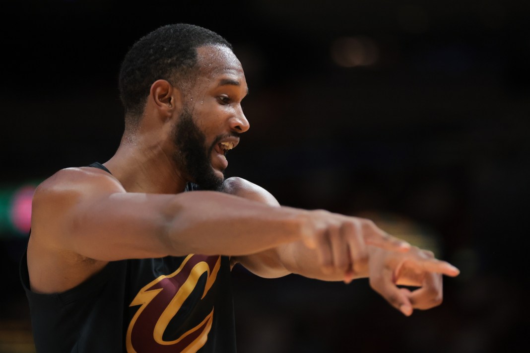 Cleveland Cavaliers forward Evan Mobley (4) signals while talking to a referee during the second quarter of game four in the first round of the 2025 NBA Playoffs against the Miami Heat at Kaseya Center in Miami, Florida, on April 28, 2025.