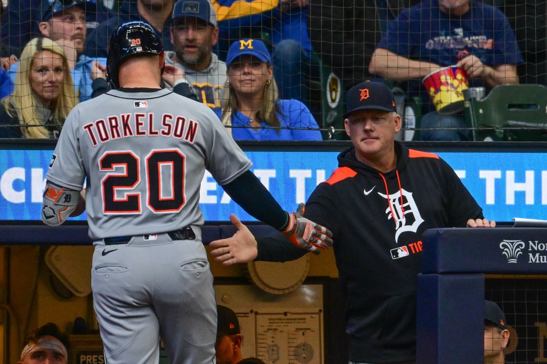 Detroit Tigers first baseman Spencer Torkelson (20) is greeted by manager A.J. Hinch after hitting a solo home run in the sixth inning against the Milwaukee Brewers at American Family Field in Milwaukee, Wisconsin, on April 16, 2025.