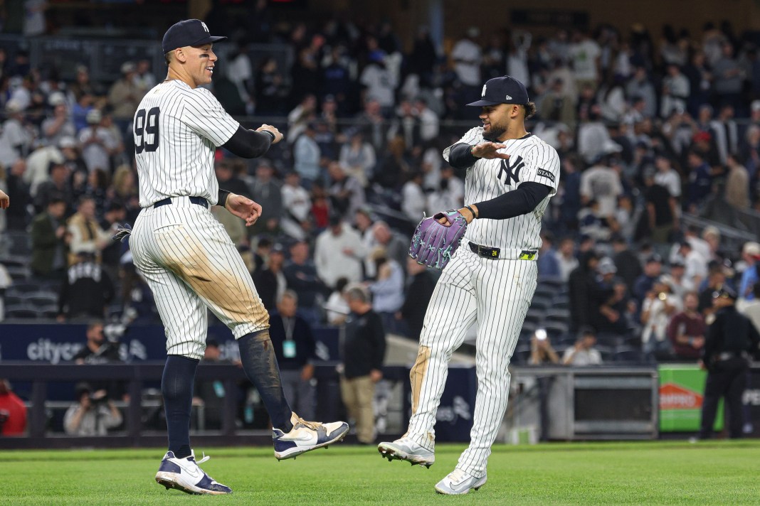 New York Yankees center fielder Aaron Judge (99) celebrates with center fielder Trent Grisham (12) after defeating the Arizona Diamondbacks at Yankee Stadium in the Bronx, New York, on April 3, 2025.