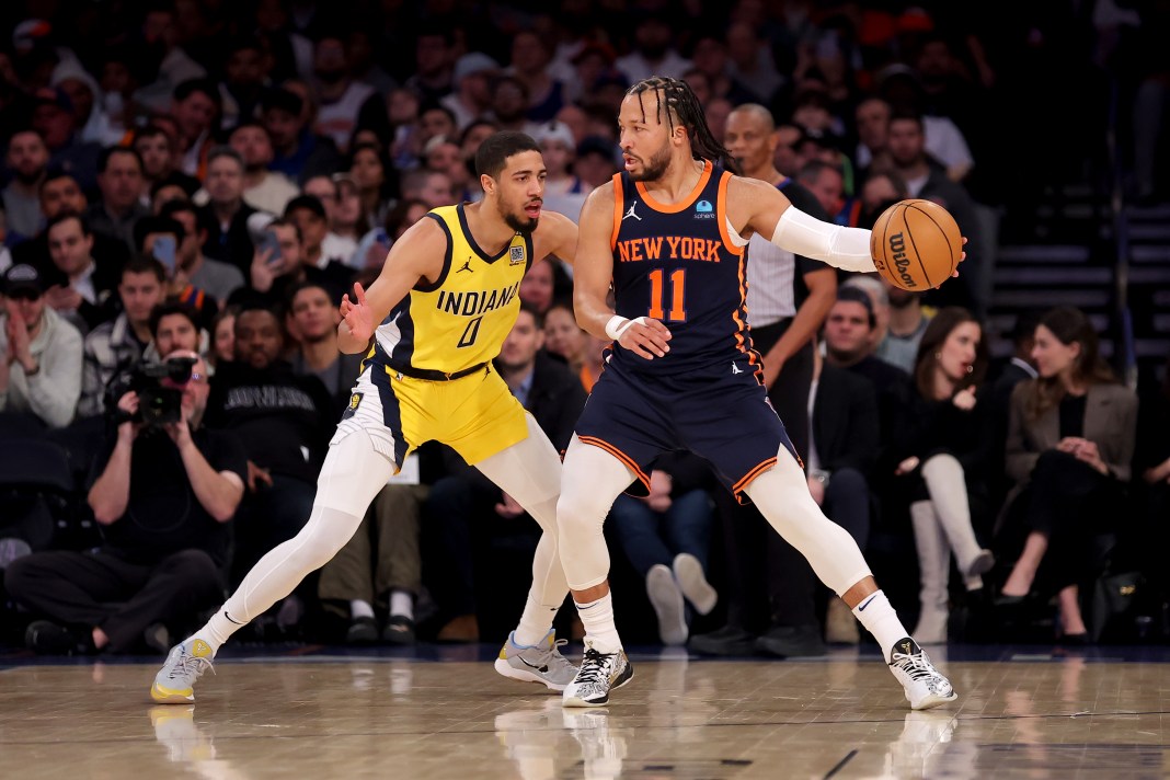 New York Knicks guard Jalen Brunson (11) controls the ball against Indiana Pacers guard Tyrese Haliburton (0) during the first quarter of the game at Madison Square Garden in New York, New York, on February 1, 2024.