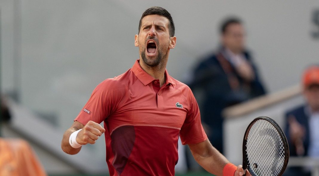 Novak Djokovic celebrates a big point against Francisco Cerundolo at the 2024 French Open in Roland Garros.