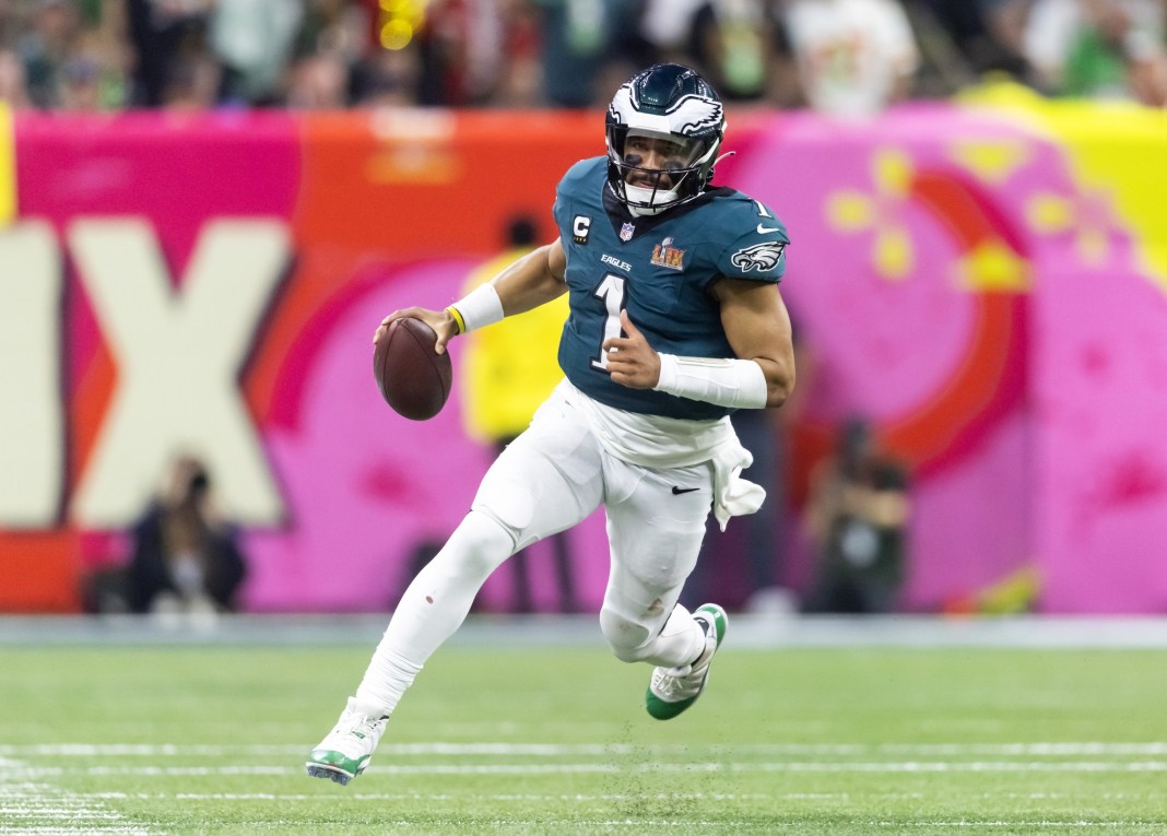 Philadelphia Eagles star Jalen Hurts runs against the Kansas City Chiefs in Super Bowl LIX.
