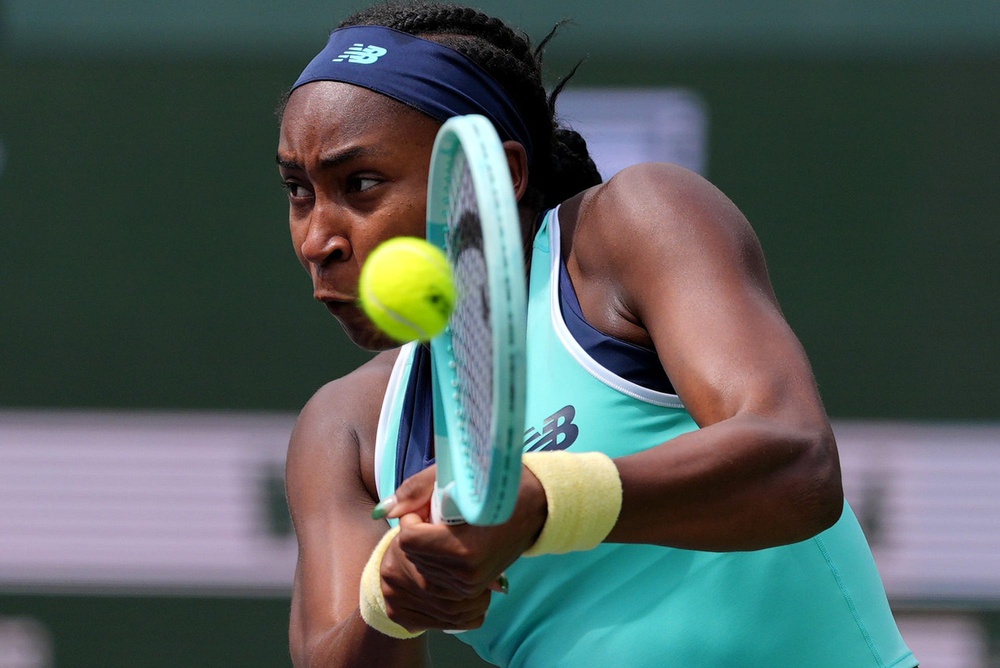Coco Gauff hits a backhand at the 2025 BNP Paribas Open at Indian Wells.