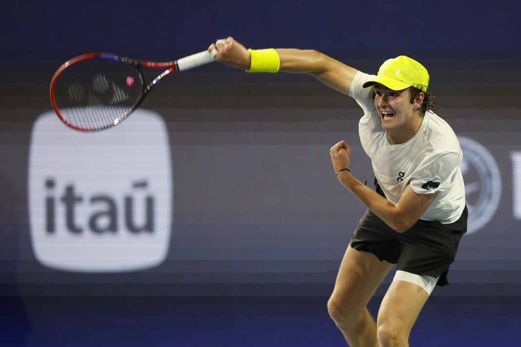 Tennis: Miami Open Joao Fonseca serves against Alex de Minaur at the 2025 Miami Open.