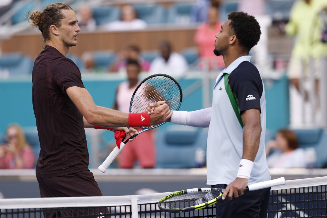 Alexander Zverev and Arthur Fils meet at the net after a match at the Miami Open in 2025.