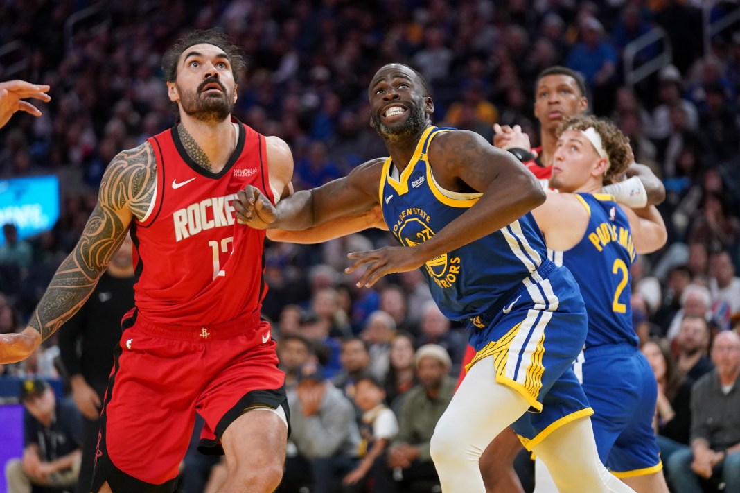 NBA: Houston Rockets at Golden State Warriors Rockets big man Steven Adams tries to get a rebound over Warriors forward Draymond Green in the 2024-25 NBA Playoffs.