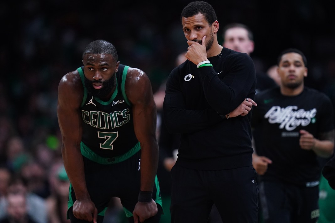 Celtics star Jaylen Brown talks to coach Joe Mazzulla during the 2024-25 NBA Playoffs.