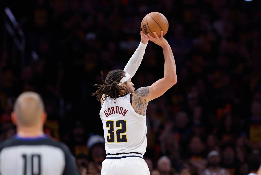 NBA: Playoffs-Denver Nuggets at Oklahoma City Thunder Denver Nuggets forward Aaron Gordon (32) shoots a three-point basket to win game one of the second round against the Oklahoma City Thunder during the 2025 NBA Playoffs at Paycom Center in Oklahoma City, Oklahoma, on May 5, 2025.