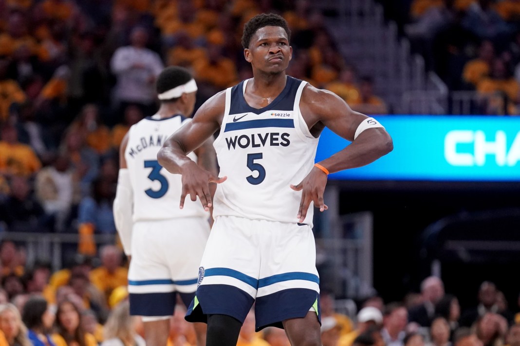 Timberwolves superstar Anthony Edwards celebrates a big 3 against the Warriors during the 2024-25 NBA Playoffs.