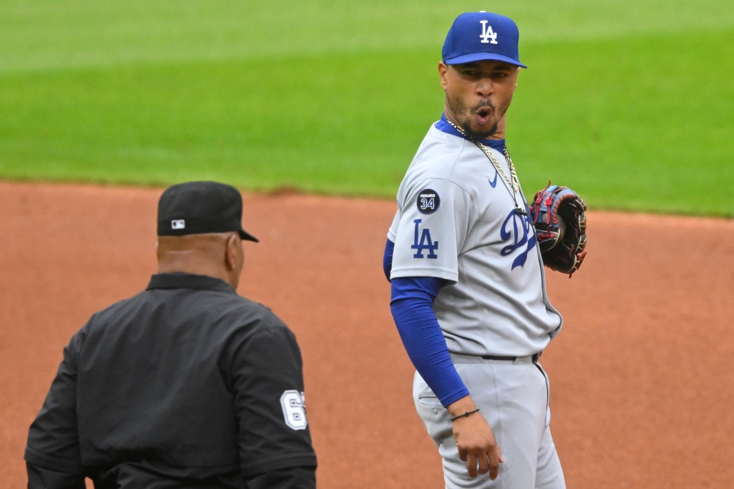 Los Angeles Dodgers shortstop Mookie Betts (50) reacts to a call by umpire Laz Diaz (63) during the first inning of the game against the Cleveland Guardians at Progressive Field in Cleveland, Ohio, on May 27, 2025.