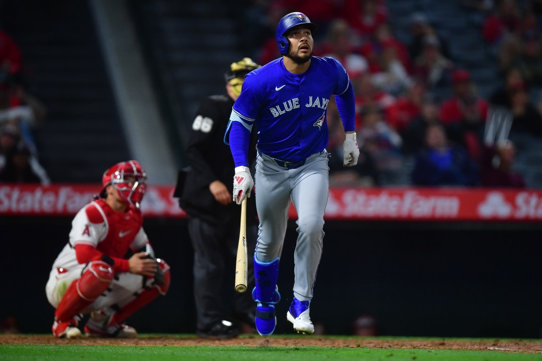 Toronto Blue Jays right fielder Anthony Santander (25) hits a solo home run during the eighth inning of the game against the Los Angeles Angels at Angel Stadium in Anaheim, California, on May 6, 2025.