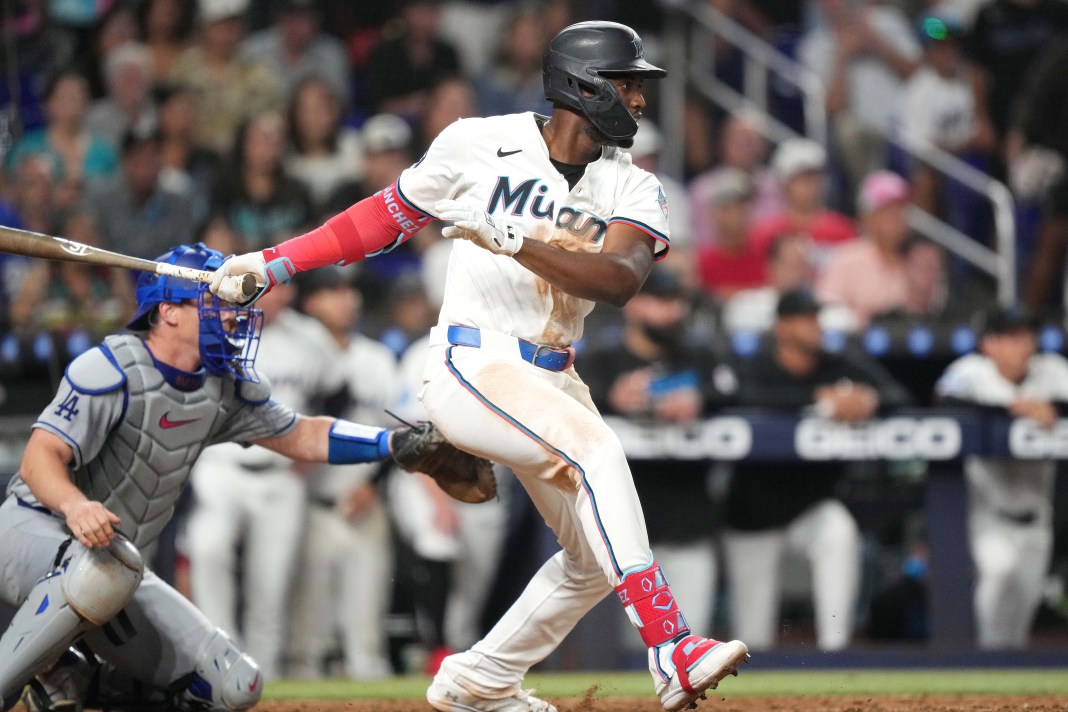 Miami Marlins right fielder Jesús Sánchez (7) hits a walk-off single in the tenth inning of the game against the Los Angeles Dodgers at loanDepot Park in Miami, Florida, on May 6, 2025.