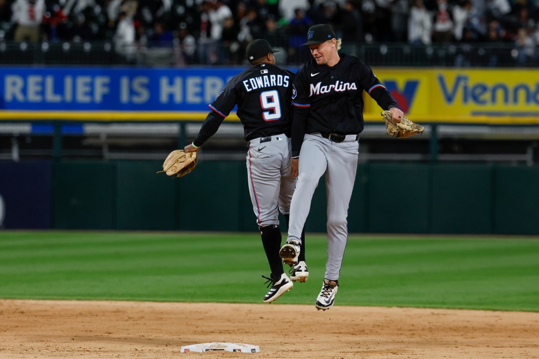 Miami Marlins players celebrate after defeating the Chicago White Sox in a baseball game at Guaranteed Rate Field in Chicago, Illinois, on May 10, 2025.