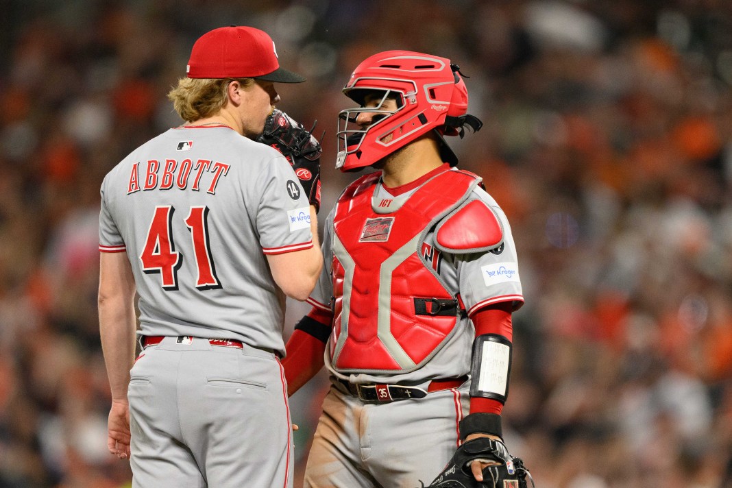 Cincinnati Reds pitcher Andrew Abbott (41) and catcher Jose Trevino (35) talk during the sixth inning of the game against the Baltimore Orioles at Oriole Park at Camden Yards in Baltimore, Maryland, on April 18, 2025.