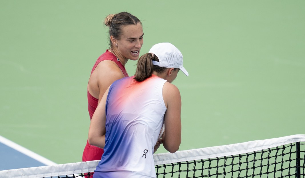 Aryna Sabalenka and Iga Swiatek meet at the net after a match at the Cincinnati Open in 2024.