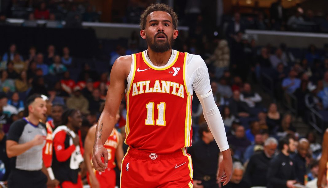 Hawks star Trae Young walks off the court against the Grizzlies during the 2024-25 NBA season.