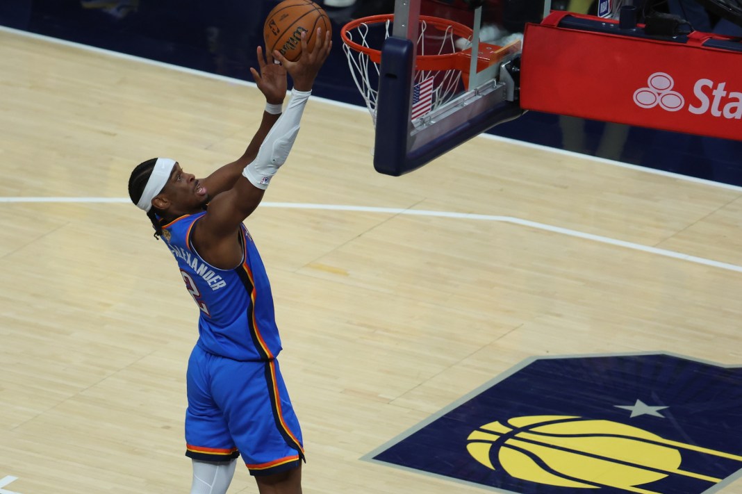 Thunder superstar Shai Gilgeous-Alexander makes a shot at the rim against the Pacers during Game 4 of the 2024-25 NBA Finals.