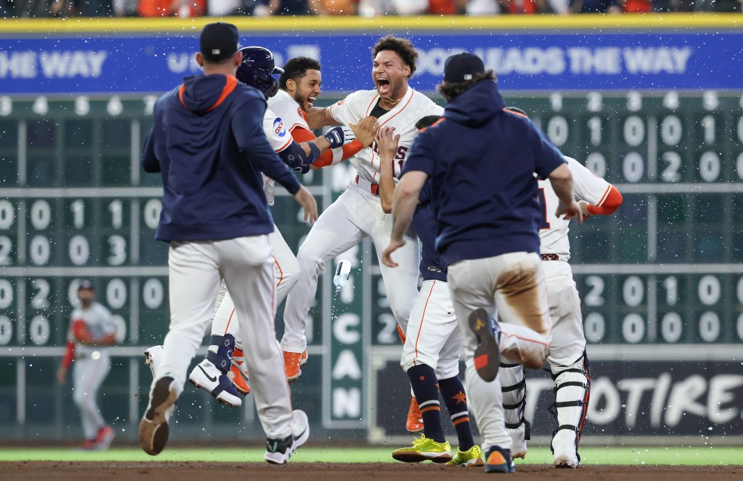 Houston Astros right fielder Cam Smith (11) celebrates with teammates after hitting a walk-off RBI single in the ninth inning against the Minnesota Twins at Daikin Park in Houston, Texas, on June 14, 2025.