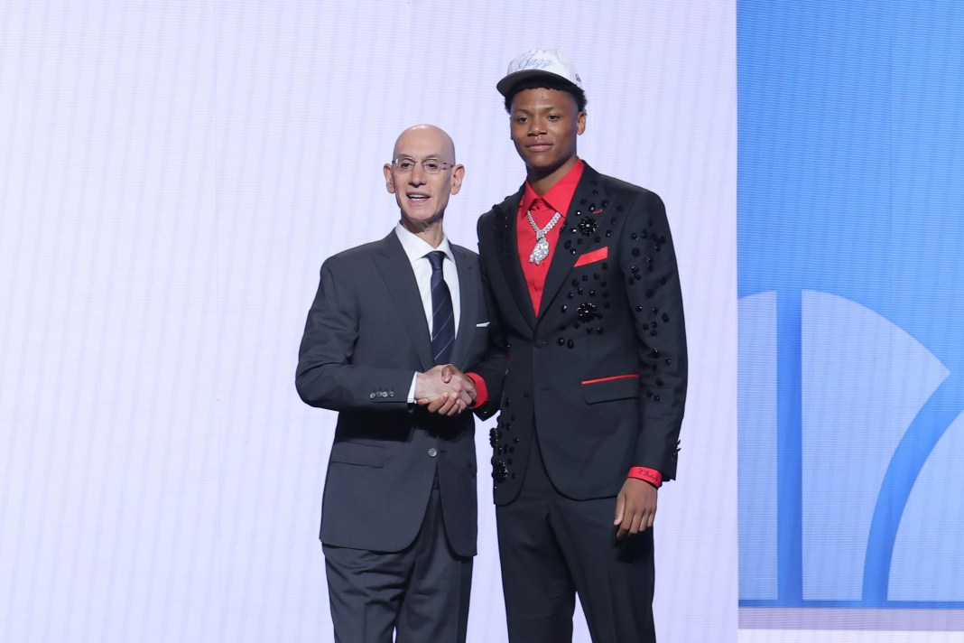 New Jazz wing Ace Bailey poses with commissioner Adam Silver at the 2025 NBA Draft.