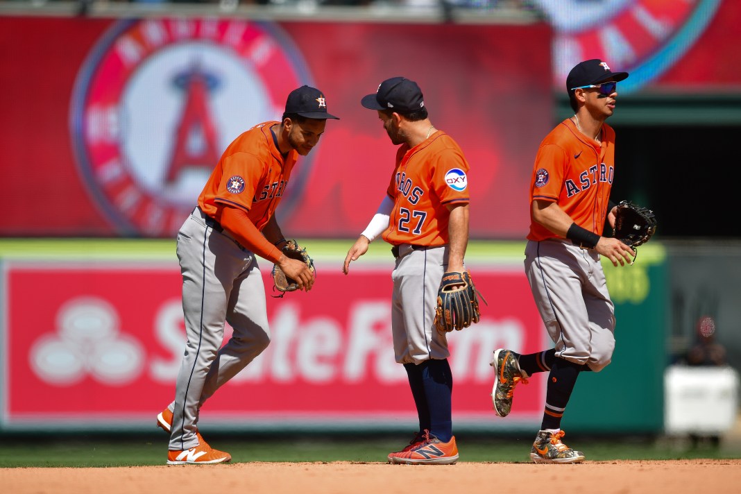 MLB: Houston Astros at Los Angeles Angels Houston Astros shortstop Jeremy Pena (3), left fielder Jose Altuve (27), and second baseman Mauricio Dubon (14) celebrate the victory against the Los Angeles Angels at Angel Stadium in Anaheim, California, on June 22, 2025. Mandatory Credit: Gary A. Vasquez-Imagn Images.