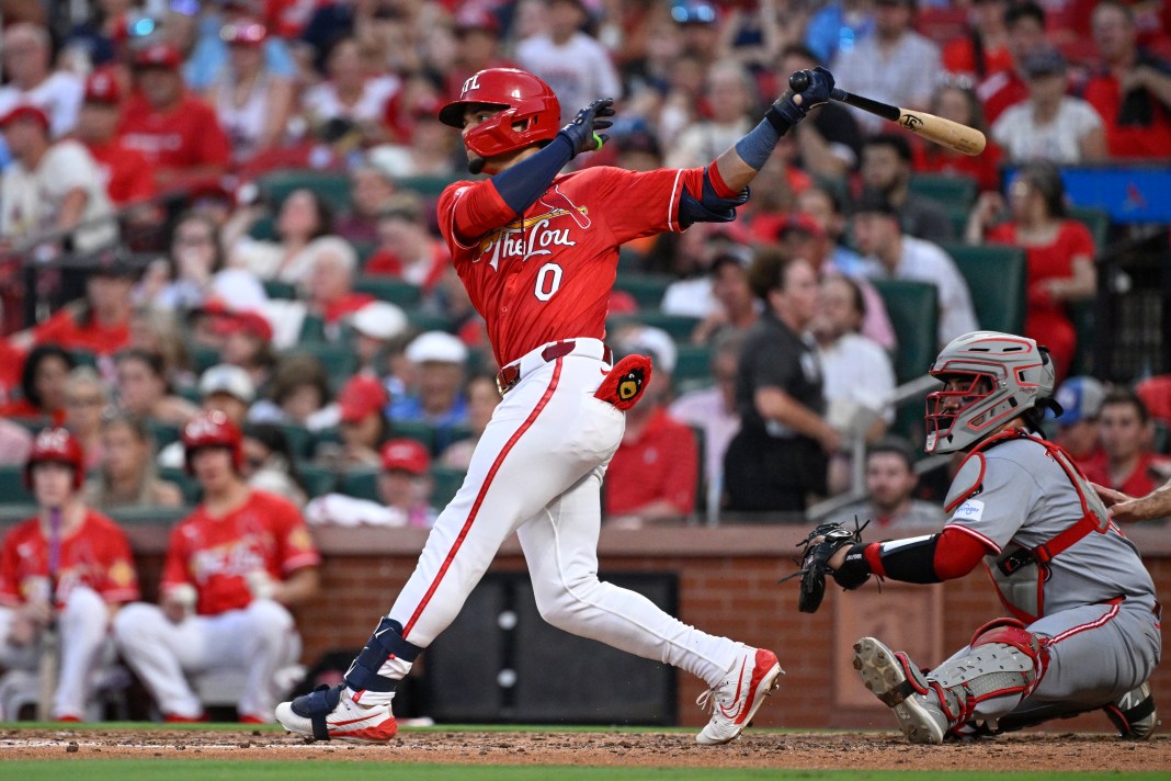 MLB: Cincinnati Reds at St. Louis Cardinals St. Louis Cardinals shortstop Masyn Winn (0) hits an RBI single against the Cincinnati Reds in the seventh inning at Busch Stadium in St. Louis, Missouri, on June 20, 2025.
