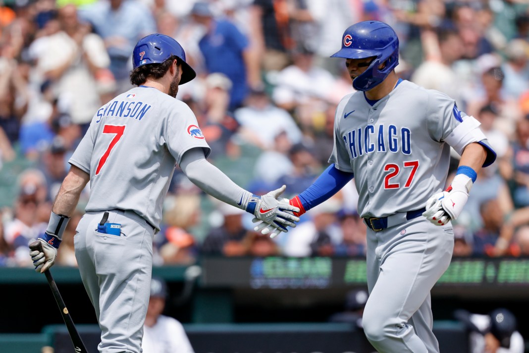 Chicago Cubs outfielder Seiya Suzuki (27) receives congratulations from shortstop Dansby Swanson (7) after hitting a home run in the eighth inning of the game against the Detroit Tigers at Comerica Park in Detroit, Michigan, on June 7, 2025.