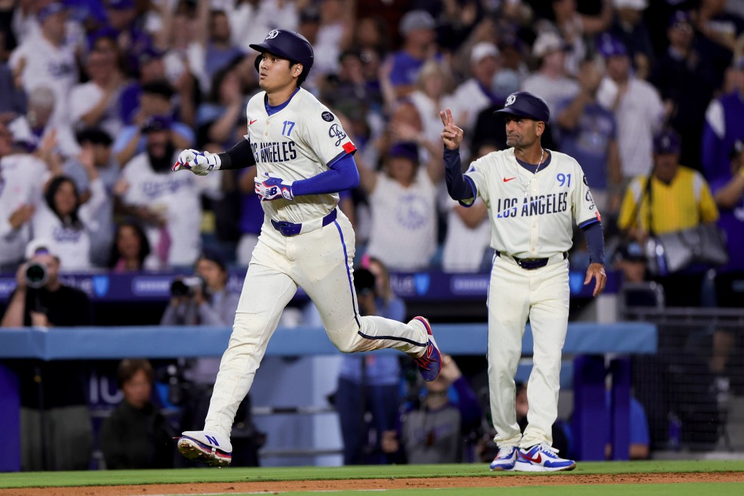 MLB: San Francisco Giants at Los Angeles Dodgers Los Angeles Dodgers designated hitter Shohei Ohtani (left) celebrates with third base coach Dino Ebel after hitting a solo home run during the sixth inning against the San Francisco Giants at Dodger Stadium in Los Angeles, California, on June 14, 2025.