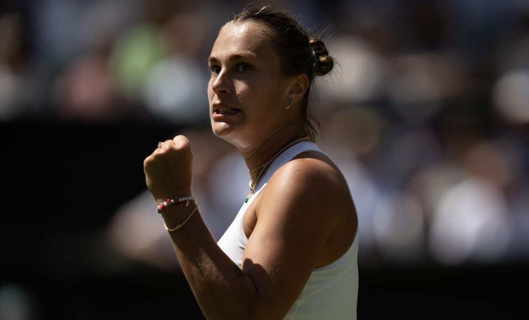 Aryna Sabalenka celebrates a big point against Laura Siegemund in the 2025 Wimbledon quarterfinals.