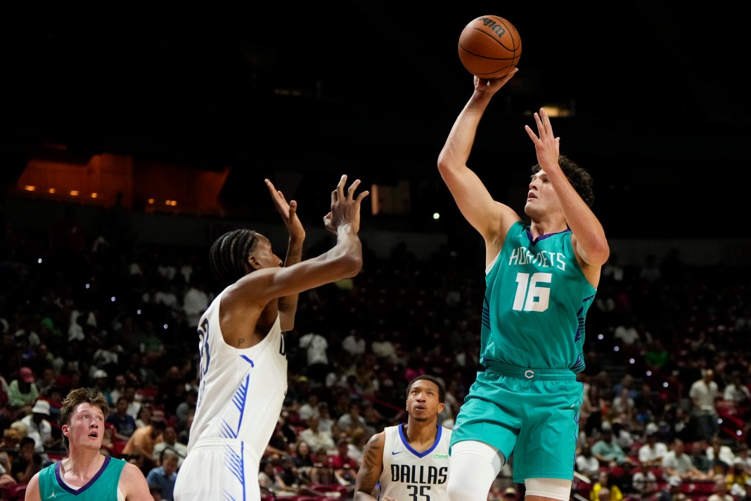 Charlotte Hornets forward PJ Hall (16) shoots the ball against Dallas Mavericks center Jamarion Sharp (33) during the second half of an NBA basketball game at the Thomas & Mack Center in Las Vegas, NV, on July 14, 2025.