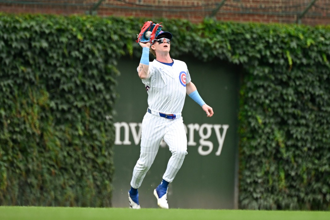 MLB: Boston Red Sox at Chicago Cubs Chicago Cubs outfielder Pete Crow-Armstrong (4) catches a fly ball hit by first baseman Justin Turner (3) during the first inning at Wrigley Field on July 20, 2025, in Chicago, Illinois. Mandatory Credit: Matt Marton-Imagn Images.