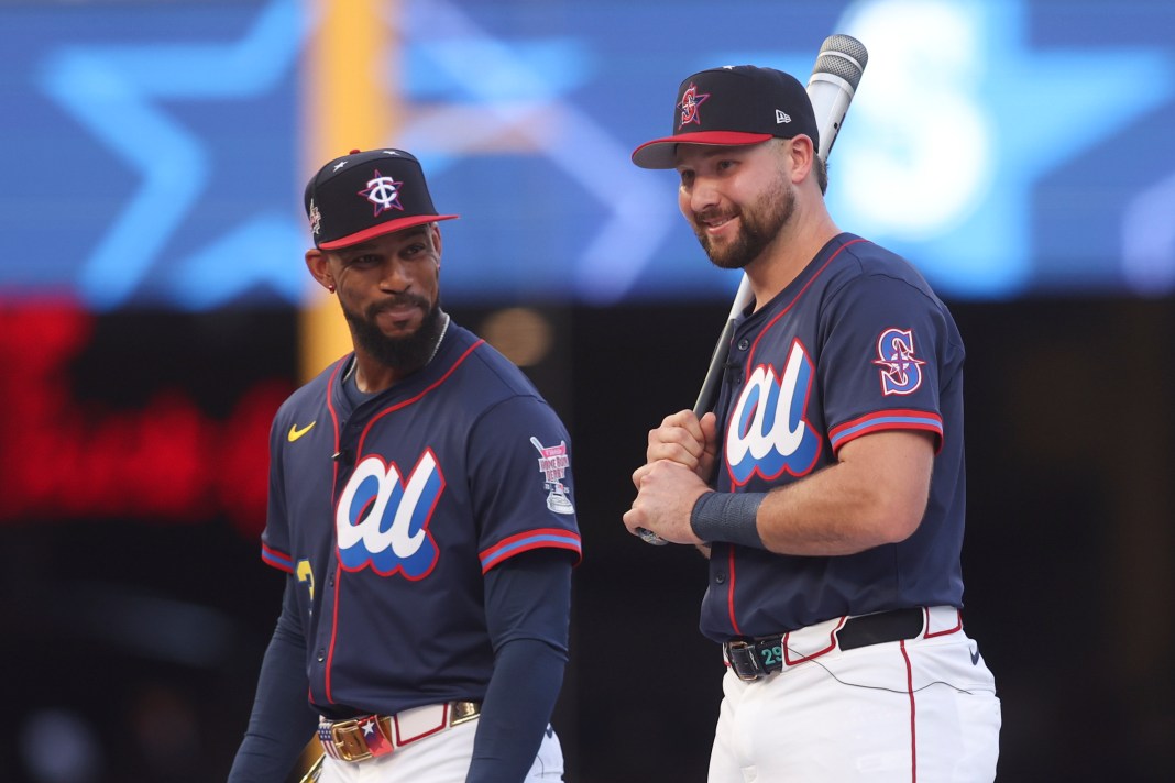 American League outfielder Byron Buxton (25) of the Minnesota Twins and American League catcher Cal Raleigh (29) of the Seattle Mariners are introduced during the 2025 Home Run Derby at Truist Park in Atlanta, GA, on July 14, 2025.