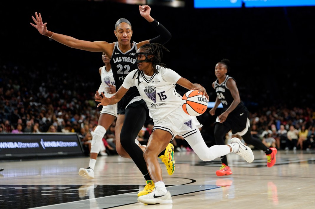 Golden State Valkyries guard Tiffany Hayes (15) drives the ball past Las Vegas Aces center A'ja Wilson (22) during the second half of a WNBA basketball game at Michelob Ultra Arena in Las Vegas, Nevada, on July 12, 2025.
