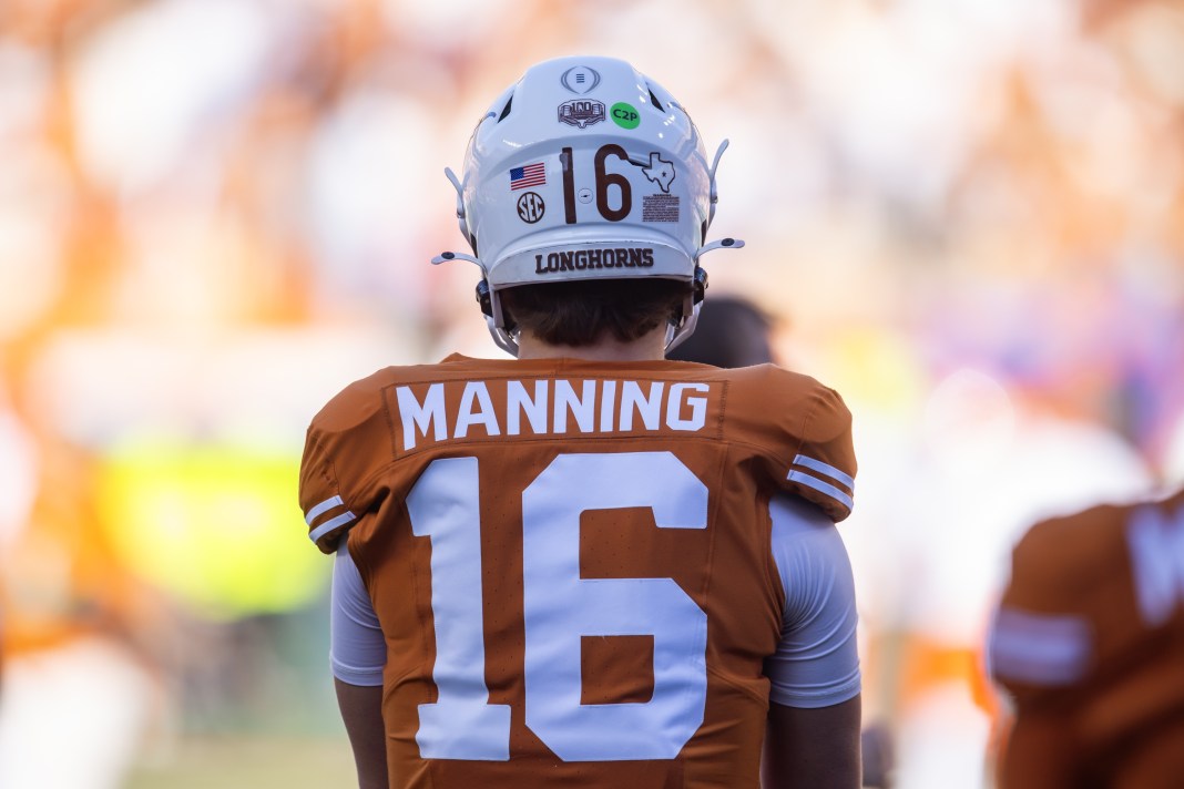 NCAA Football: CFP National Playoff First Round-Clemson at Texas Texas quarterback Arch Manning looks on in a meeting with Clemson in the 2024 College Football Playoff.