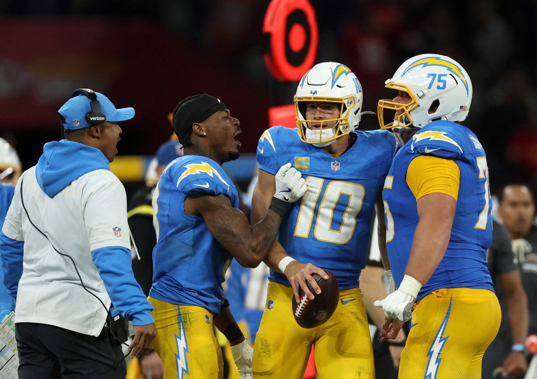 NFL: Kansas City Chiefs at Los Angeles Chargers Chargers quarterback Justin Herbert celebrates a win over the Chiefs with his teammates in the 2025 season.