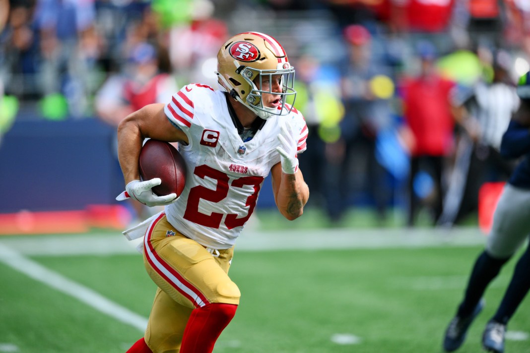 49ers running back Christian McCaffrey runs against the Seahawks during the 2025 NFL season.