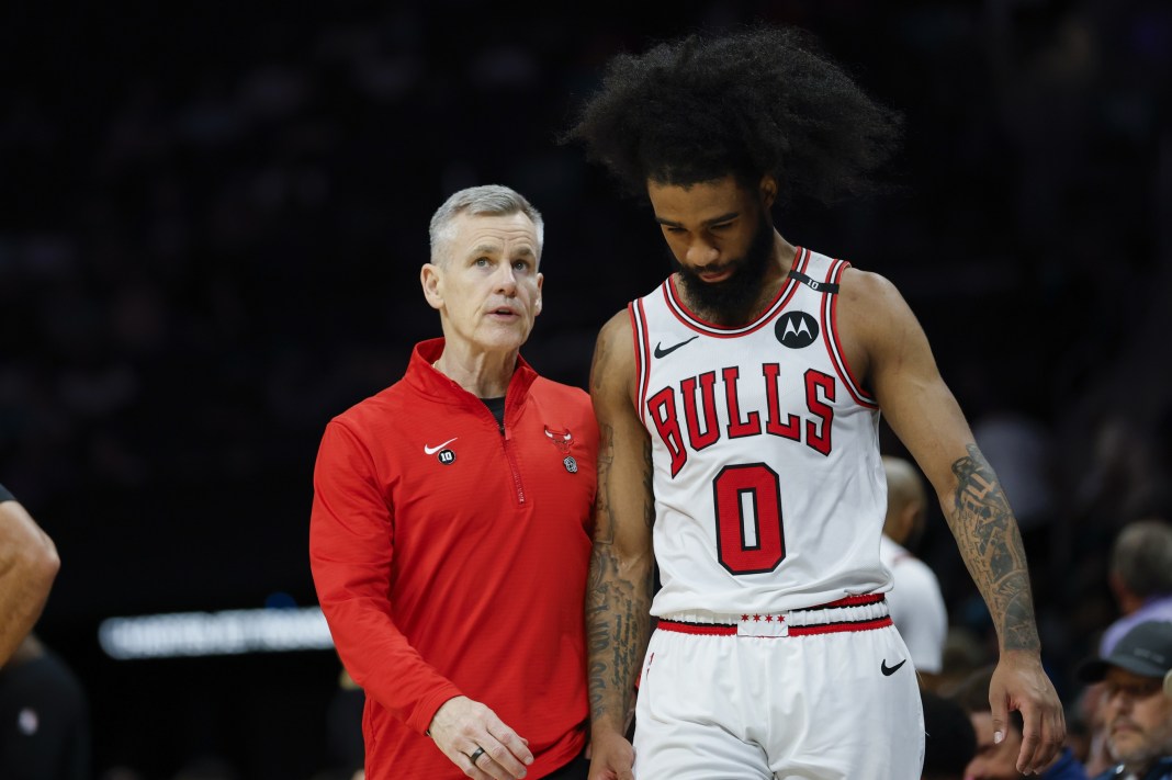 Bulls head coach Billy Donovan talks to Coby White during the 2024-25 NBA season.
