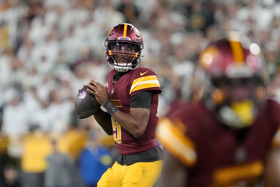 NFL: Washington Commanders at Green Bay Packers Commanders star Jayden Daniels looks to throw against the Packers during the 2025 NFL season.