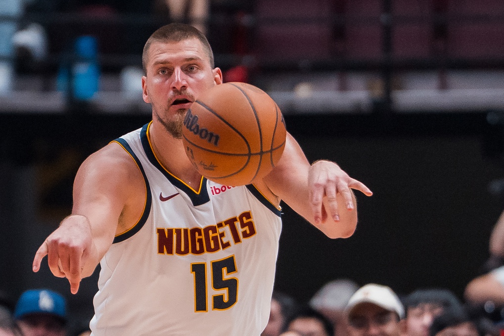 NBA: Preseason-Denver Nuggets at Toronto Raptors Nuggets superstar Nikola Jokic passes against the Raptors during the 2025-26 NBA preseason.
