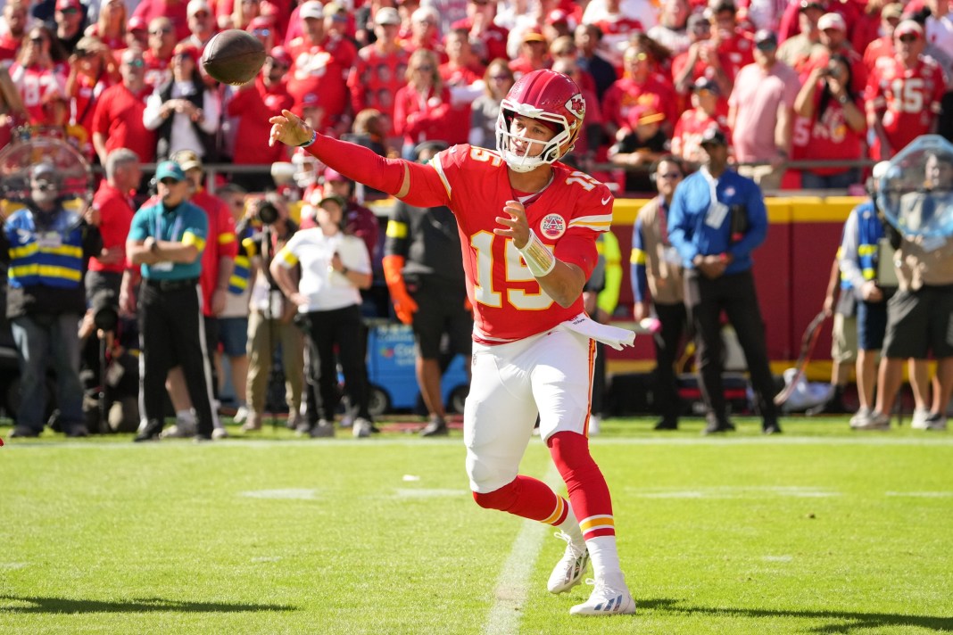 NFL: Las Vegas Raiders at Kansas City Chiefs Chiefs star Patrick Mahomes throws a pass against the Raiders during the 2025 NFL season.